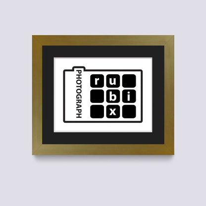 gold photo frame with black mount