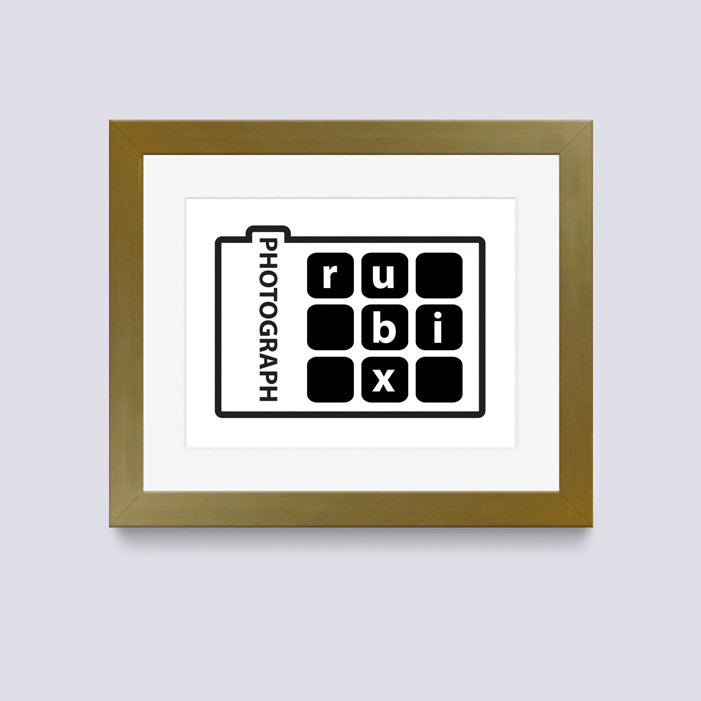 gold photo frame with white mount