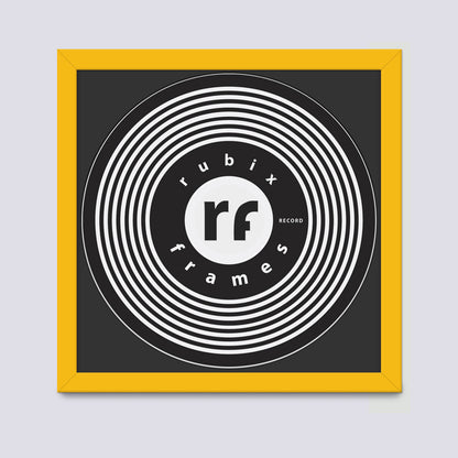 yellow vinyl record frame handmade in the uk with wooded mouldings shown with black mount